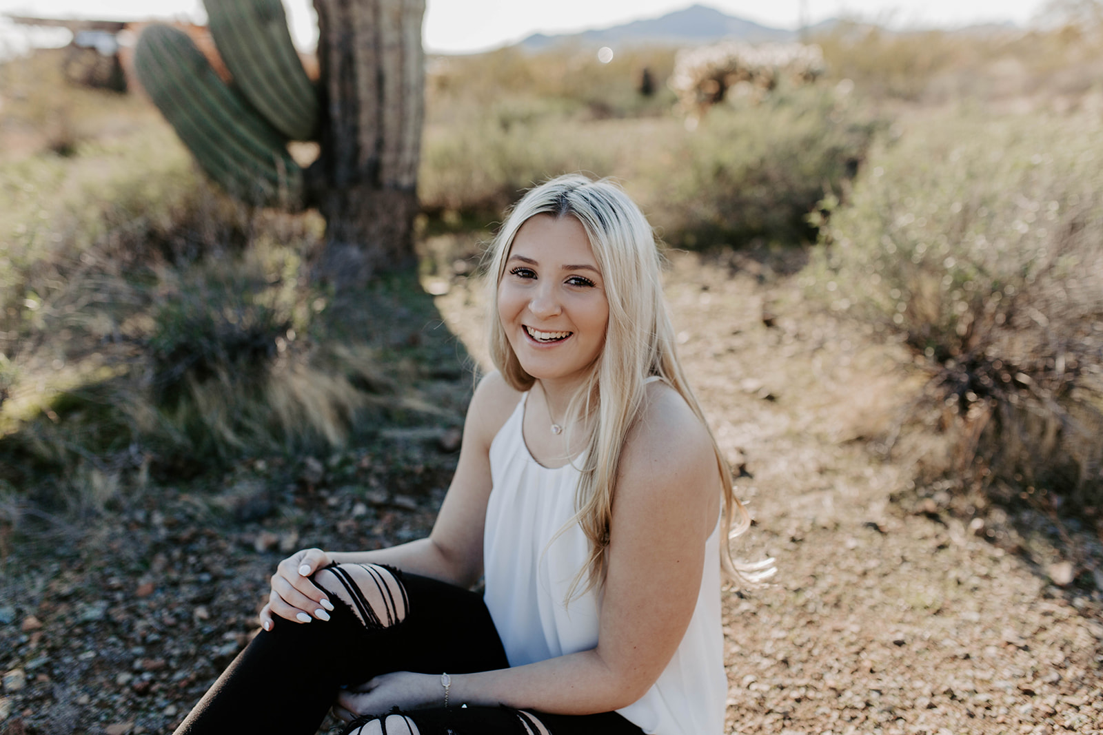 Sunny Desert Spring Senior Session by Isabella Lusk, Arizona Photographer. This blog post includes posing and outfit ideas for senior sessions.